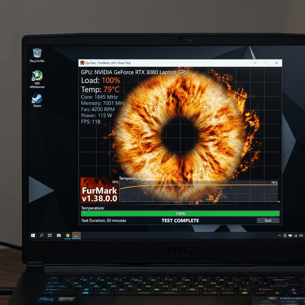 FurMark GPU stress test running at full load with temperature readout visible