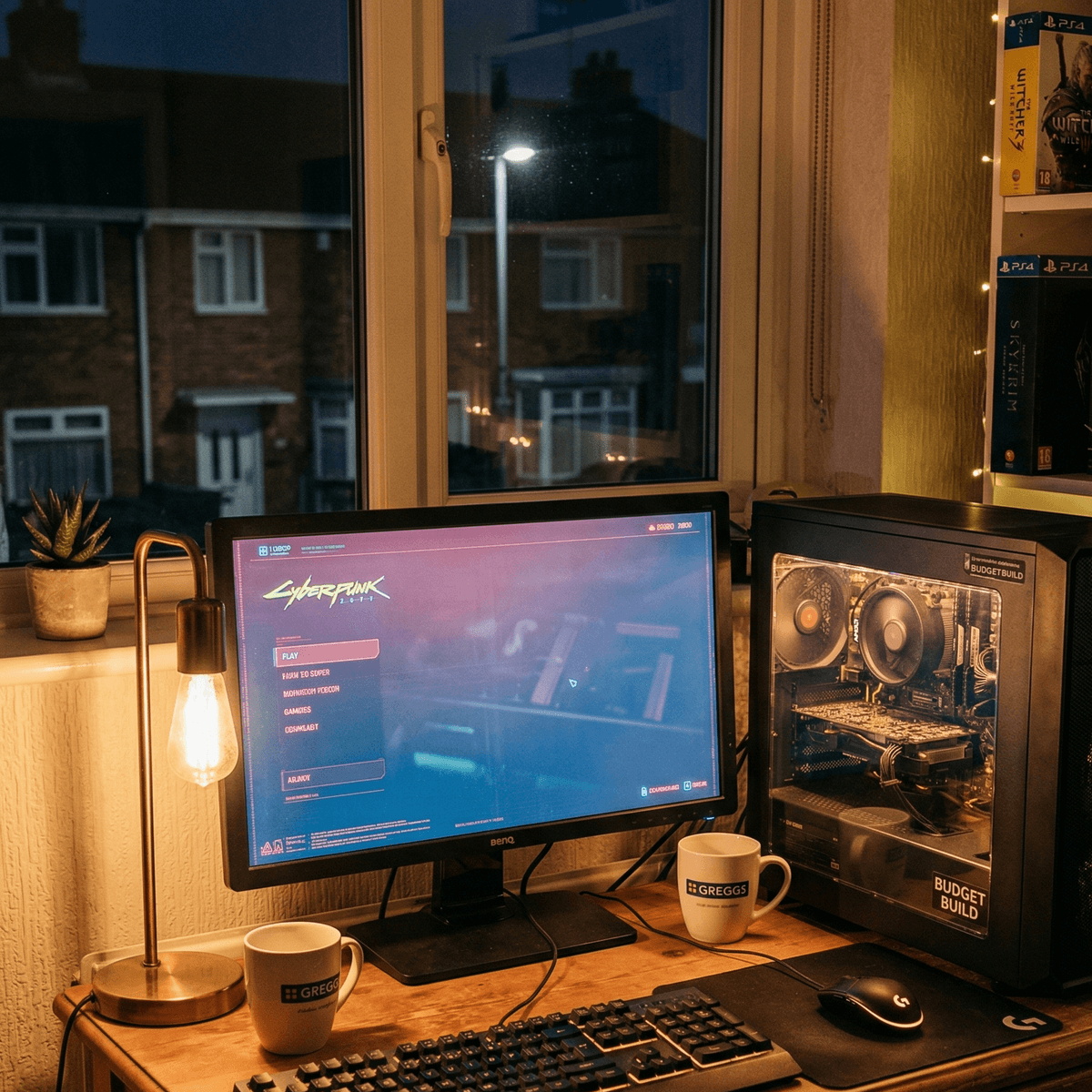 Completed budget gaming PC in a compact Micro-ATX case on a small desk, running at 1080p on a monitor, cosy UK home setting